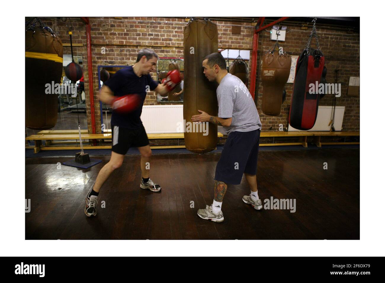 Boxing training for Richard Sharp at Fitzroy Lodge on Lambeth road in London... with Adam Martinphotograph by David Sandison The Independent Stock Photo