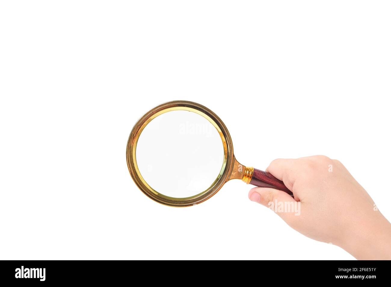 Magnifying glass in child hand on white background, isolate Stock Photo