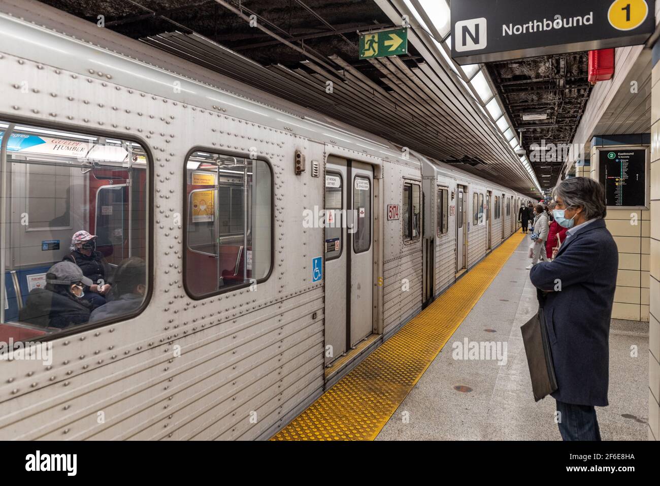 An old train arriving at Yonge-Bloor station (Line 2) Stock Photo
