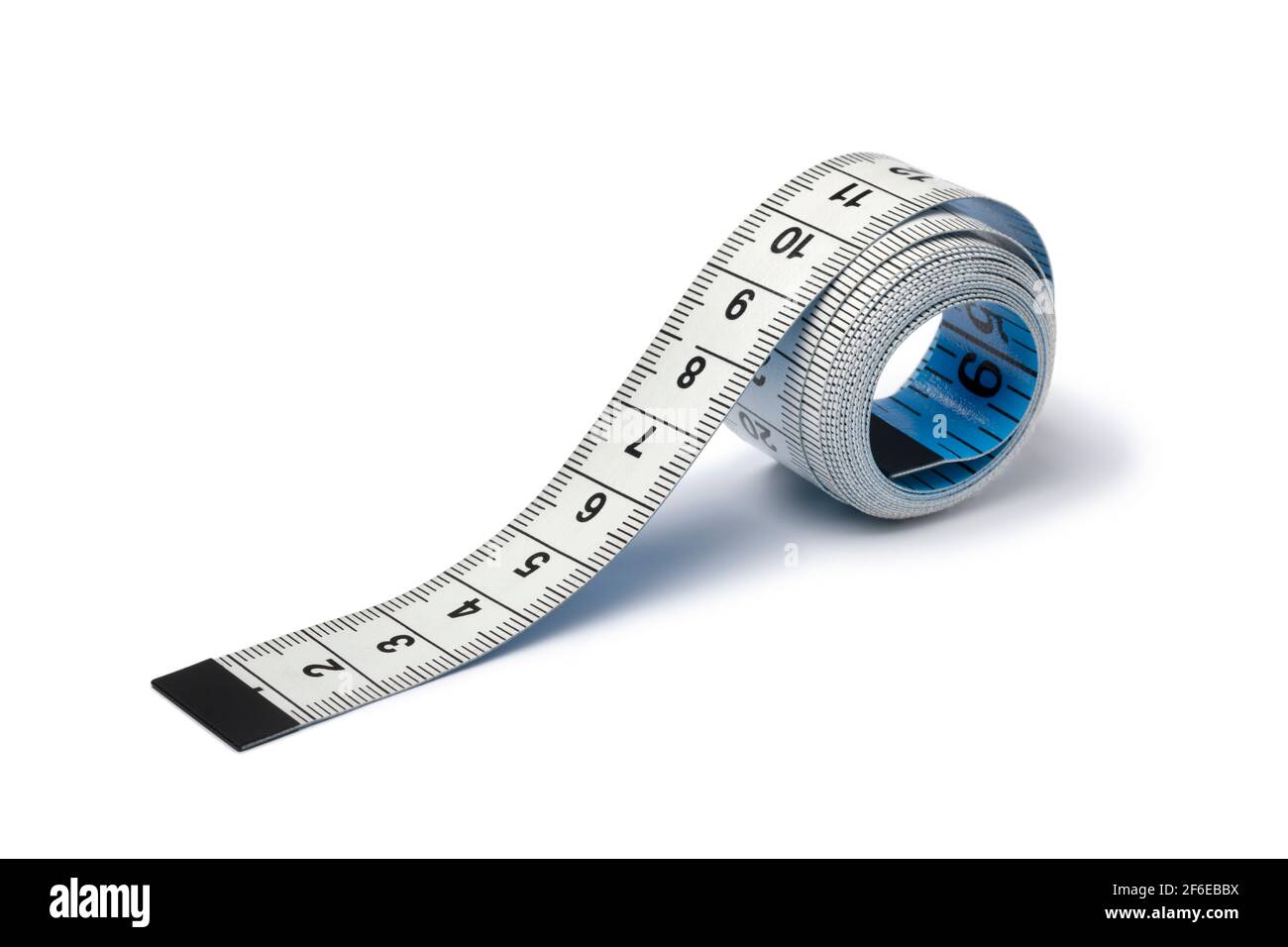 White Cloth Measuring Tape Laying Unraveled Stock Photo - Download Image  Now - Copy Space, Cut Out, Equipment - iStock