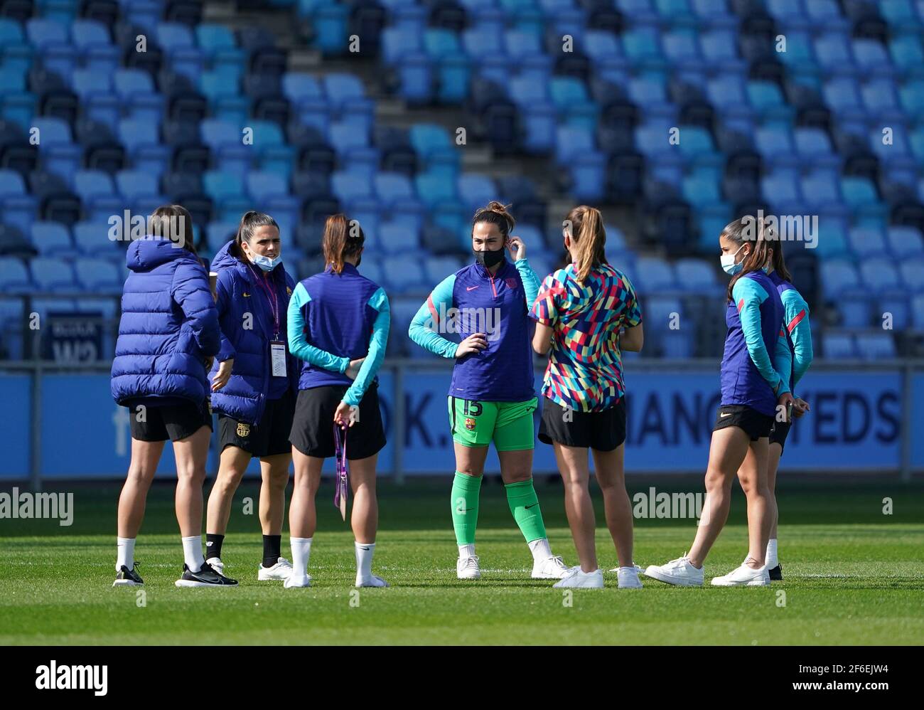 Barcelona players inspect the pitch before the 2021 UEFA Women's Champions League match at the Manchester City Academy Stadium, Manchester. Picture date: Wednesday March 31, 2021. Stock Photo