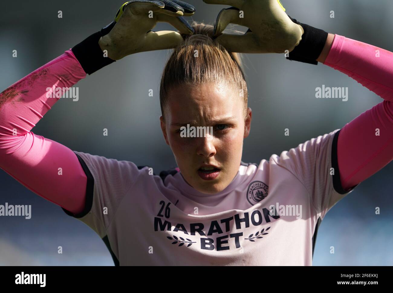 Manchester City goalkeeper Ellie Roebuck warming up before the 2021 UEFA Women's Champions League match at the Manchester City Academy Stadium, Manchester. Picture date: Wednesday March 31, 2021. Stock Photo