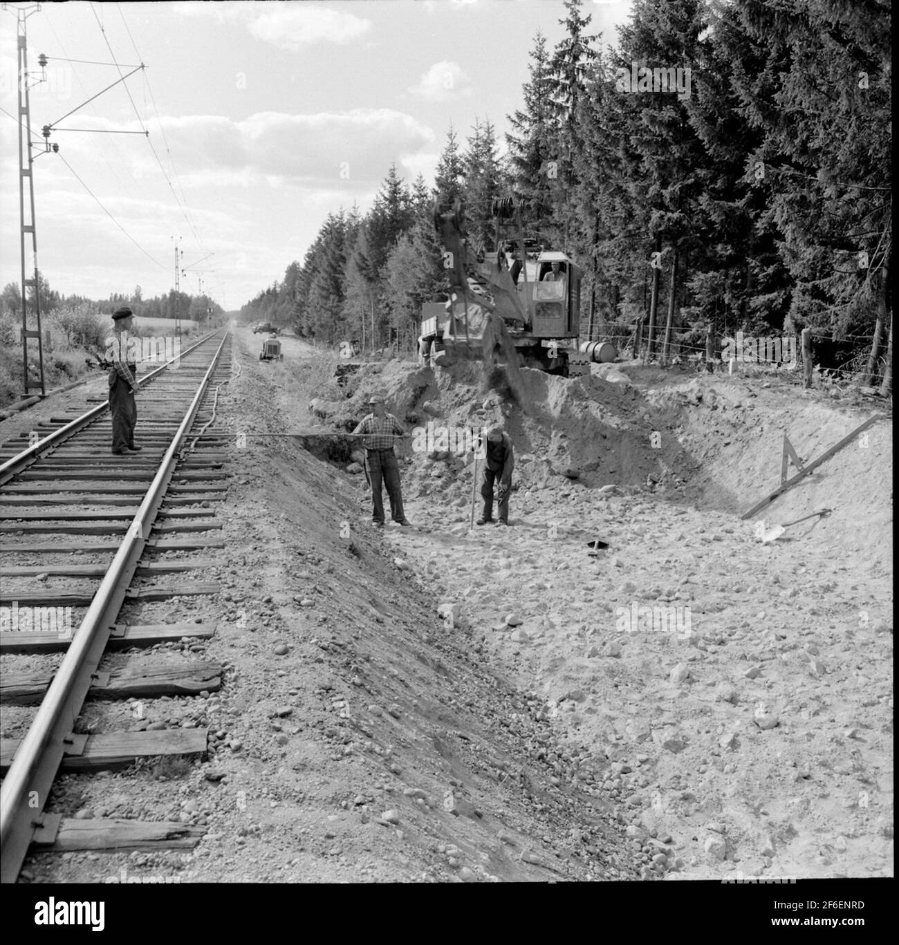 Double track work, excavator Stock Photo Alamy