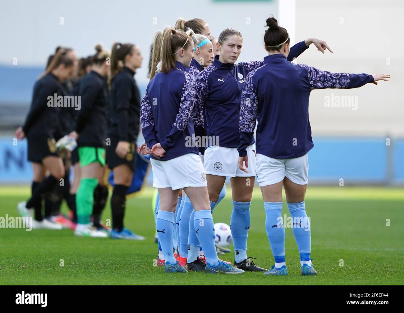 Manchester City players lien up before the 2021 UEFA Women's Champions League match at the Manchester City Academy Stadium, Manchester. Picture date: Wednesday March 31, 2021. Stock Photo