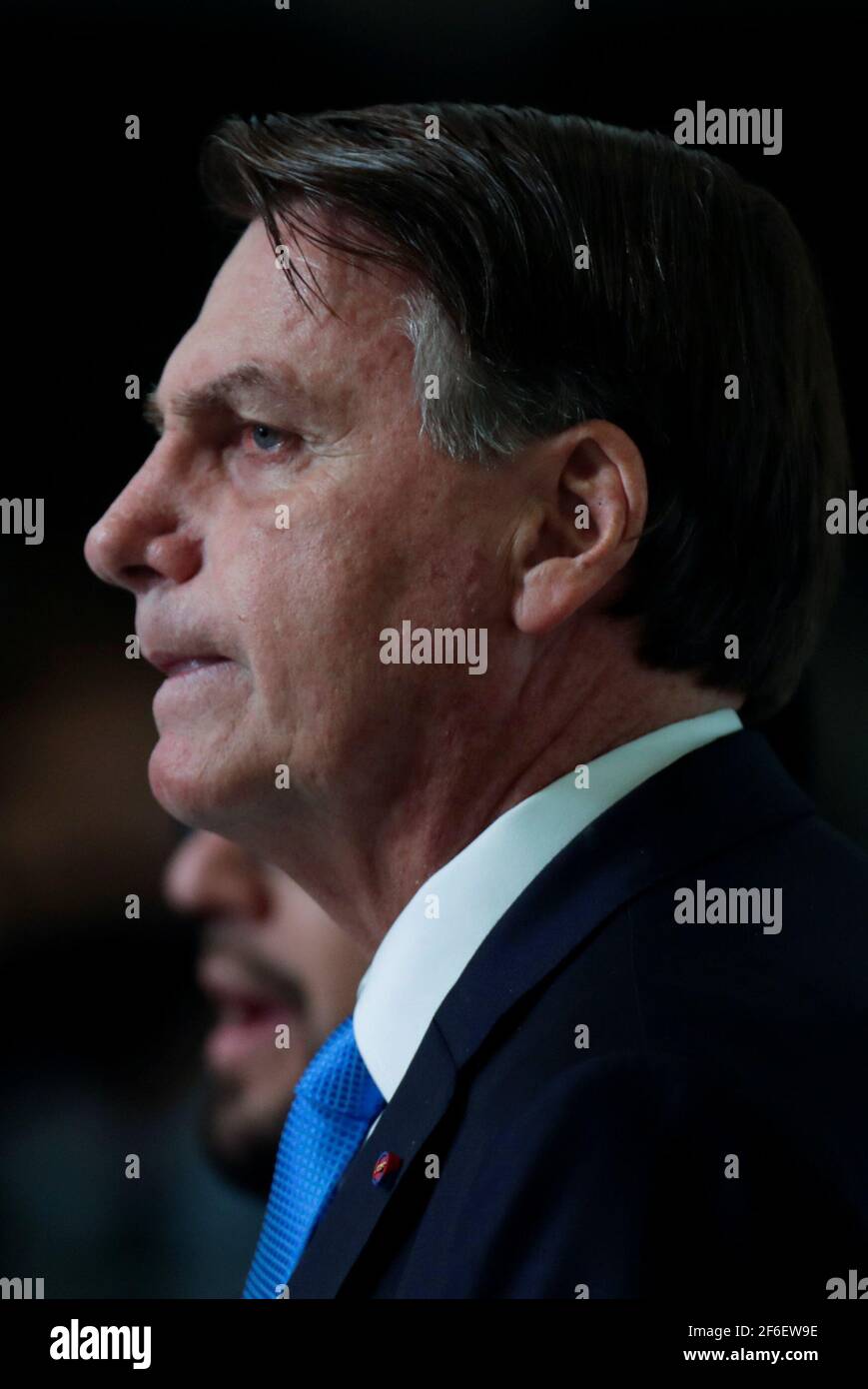Brazil's President Jair Bolsonaro gives a statement about the emergency financial aid by the federal government during coronavirus disease (COVID-19) crisis at the Planalto Palace in Brasilia, Brazil March 31, 2021. REUTERS/Ueslei Marcelino Stock Photo
