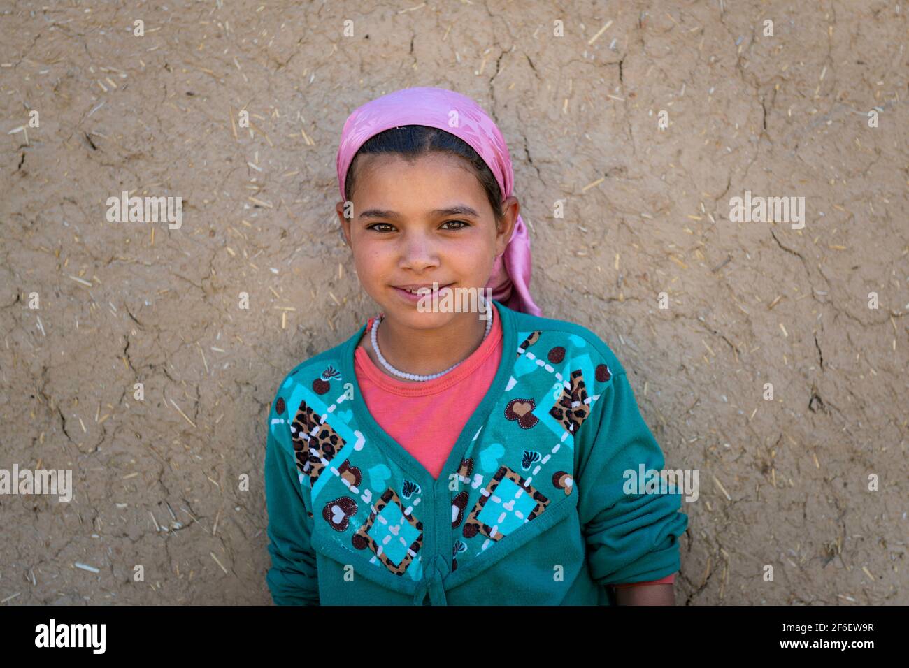 Errachidia, Morocco - April 12, 2016: Portrait of a young girl in front ...