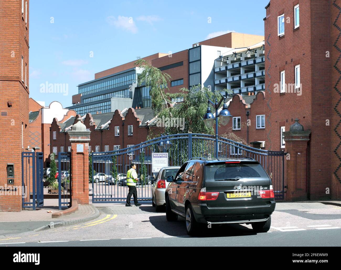 Security gates at an entrance to Symphony Court, Birmingham, a gated community of new houses and flats near the city centre. Stock Photo