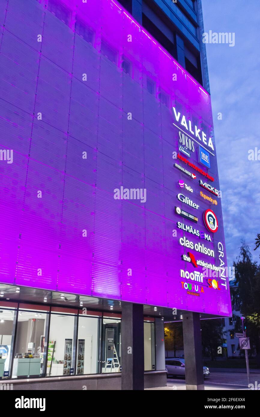 Purple light on the Valkea shopping mall at night in Oulu Finland Stock Photo