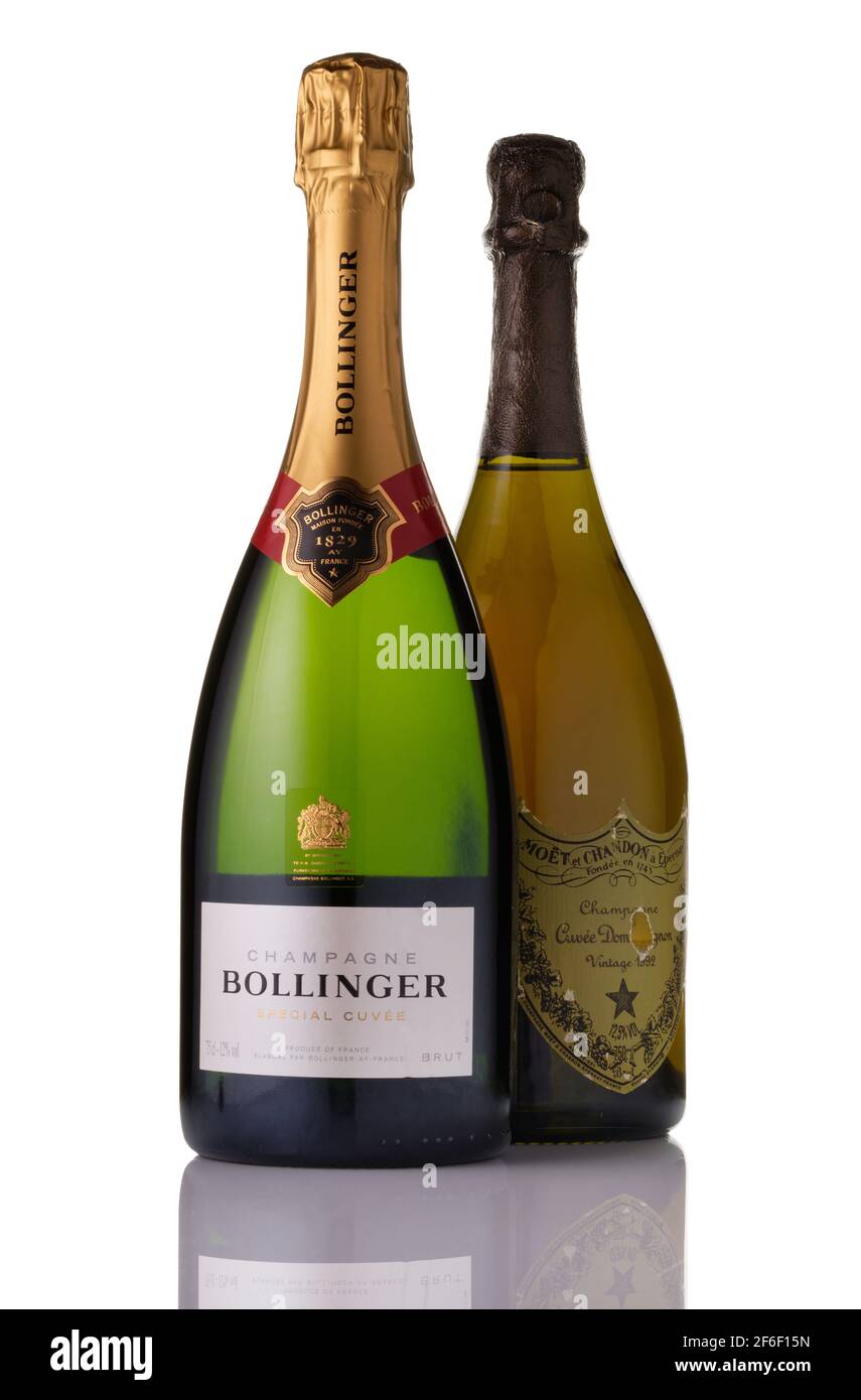 A bottle of Bollinger Champagne with a bottle of Dom Perignon 1992 . Cut out image on a white background. Stock Photo