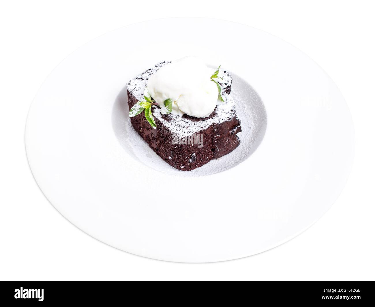 Chocolate brownie cake with vanilla ice cream on top and covered with ...