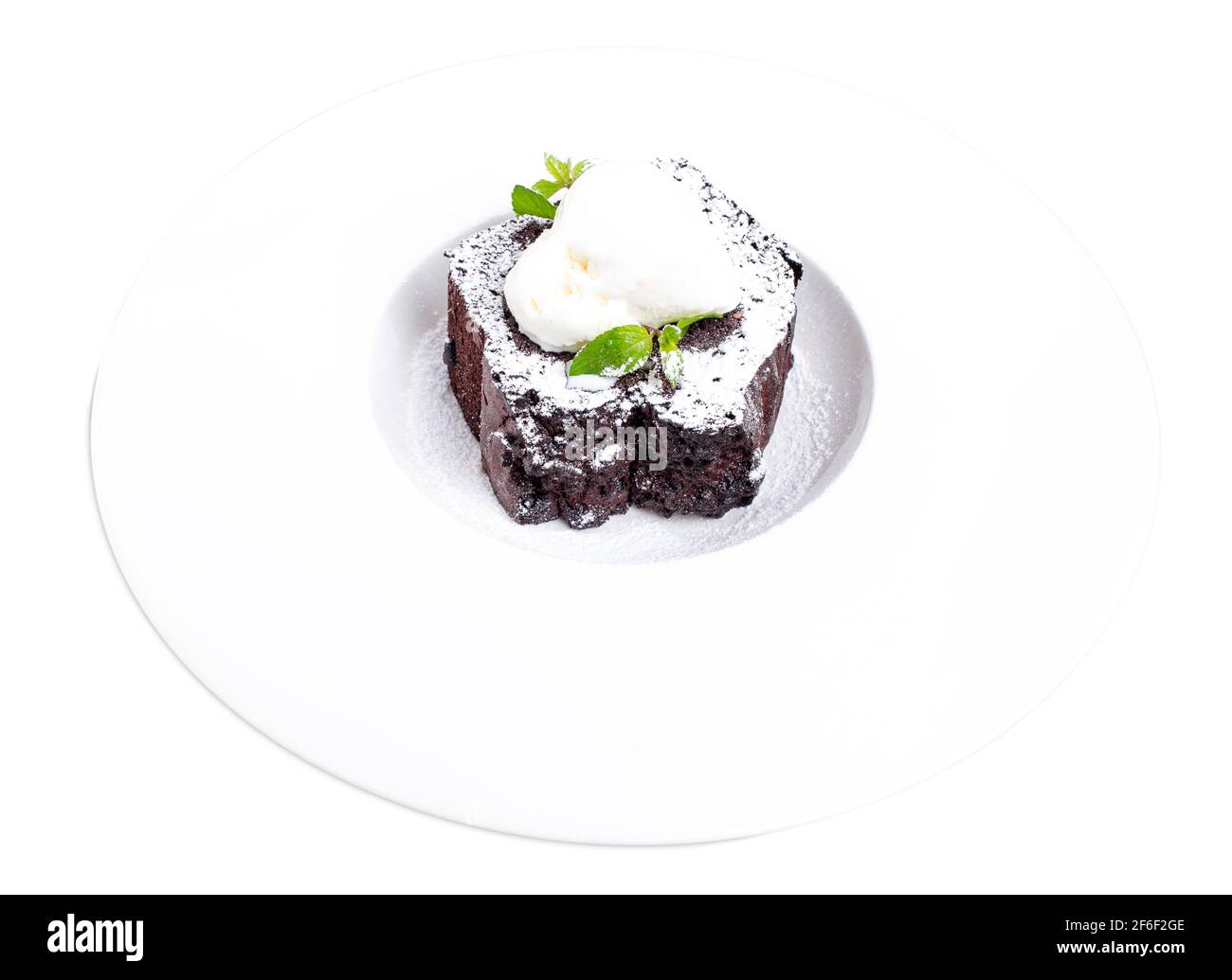 Chocolate brownie cake with vanilla ice cream on top and covered with ...