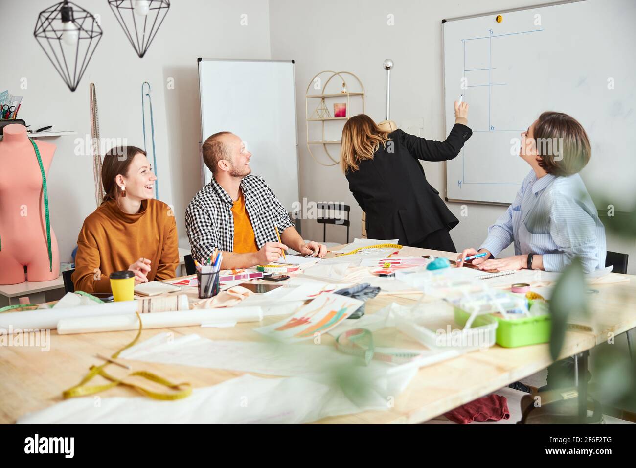 Designers having fun while developing their new style Stock Photo