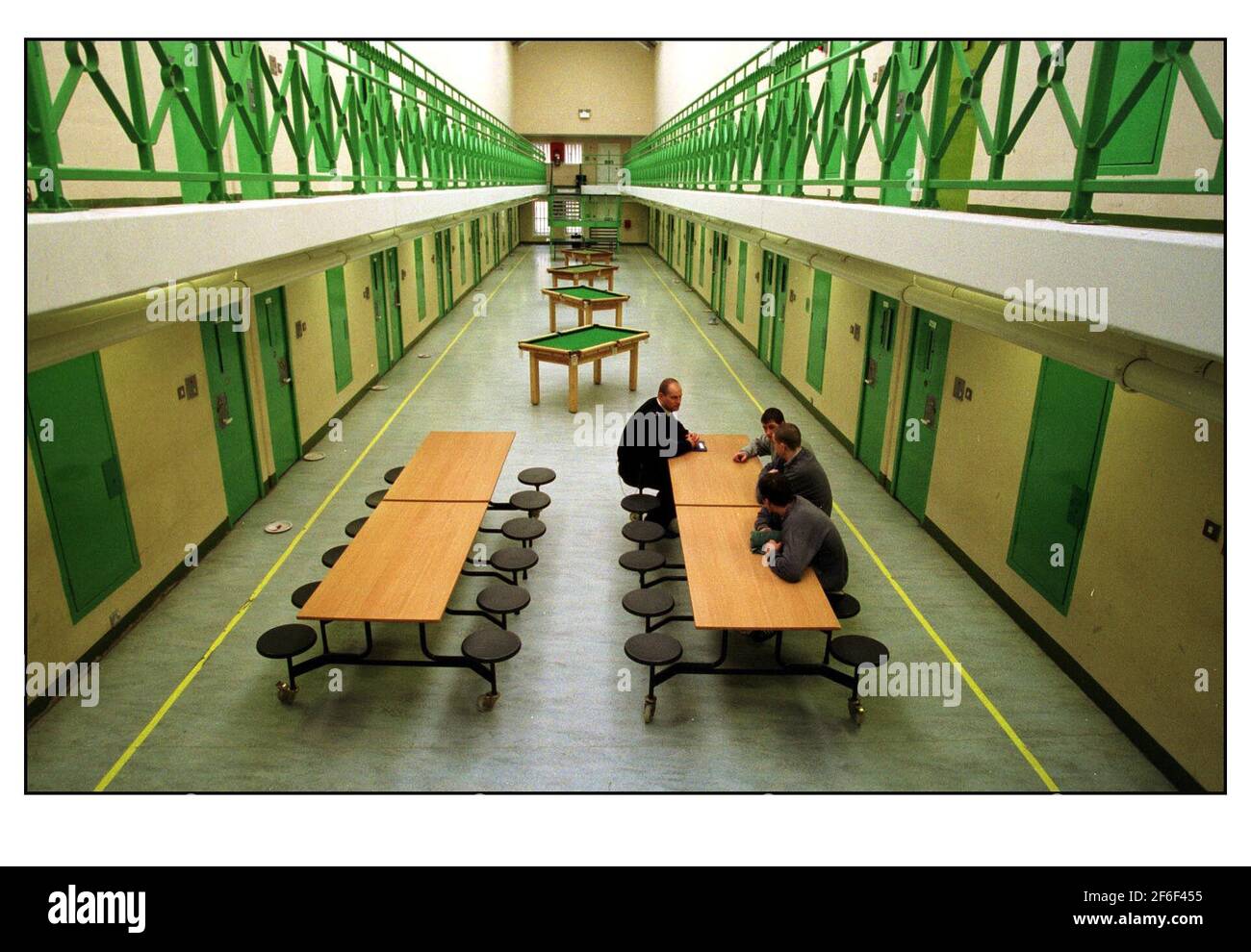 Stoke Heath Young Offenders Institution/Shropshire....A prison officer with some of the young inmates Stock Photo