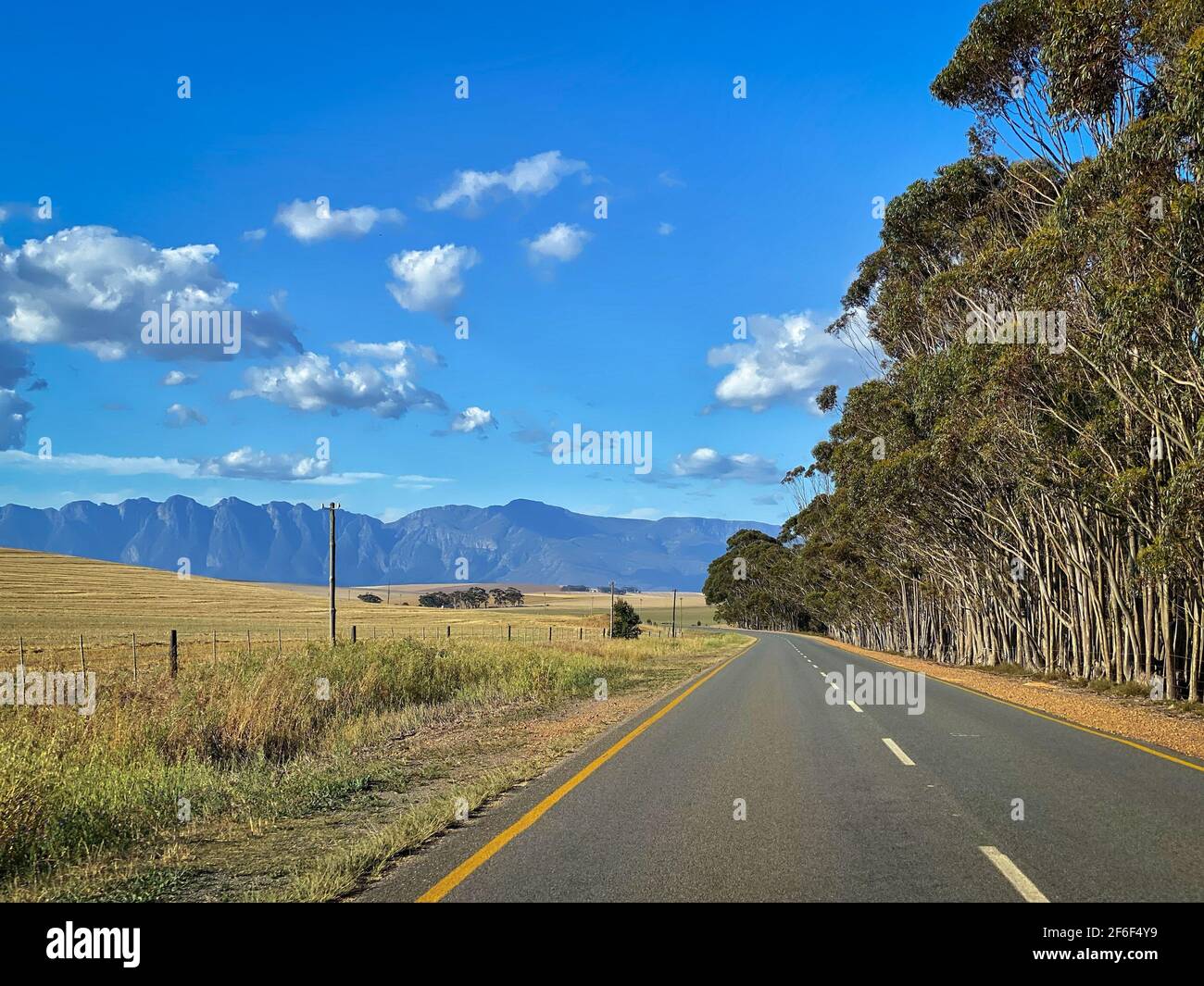 Scenic view to Riviersonderend Mountains and landscape from road R326 at Overberg district, South Africa against sky Stock Photo