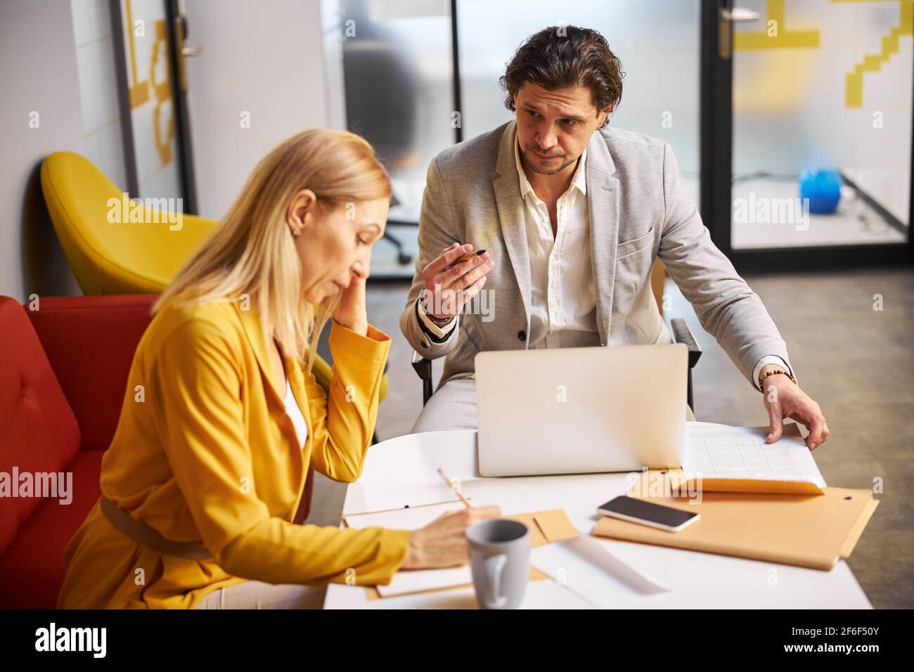 Attentive woman making notes hi-res stock photography and images - Alamy