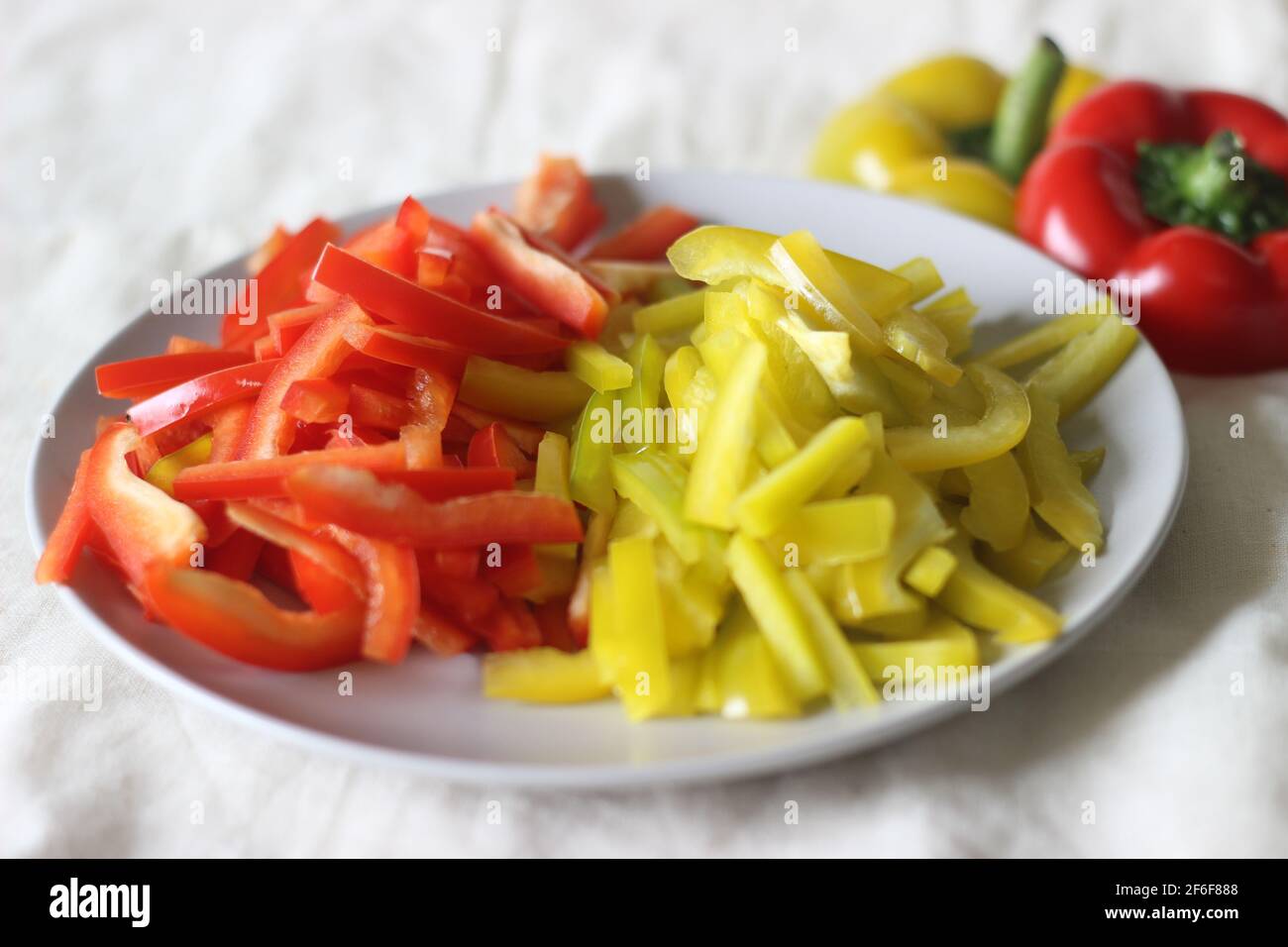 Matchstick size strips of bell pepper. Julienne style cut. Shot on white background Stock Photo
