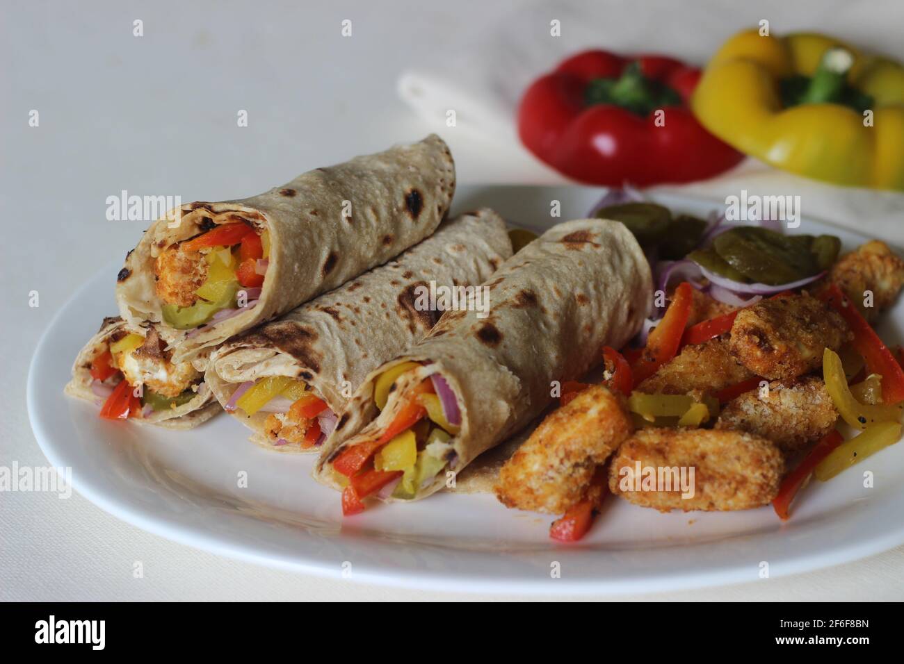 Paneer bell pepper rolls. Breaded and air fried cottage cheese, sauteed