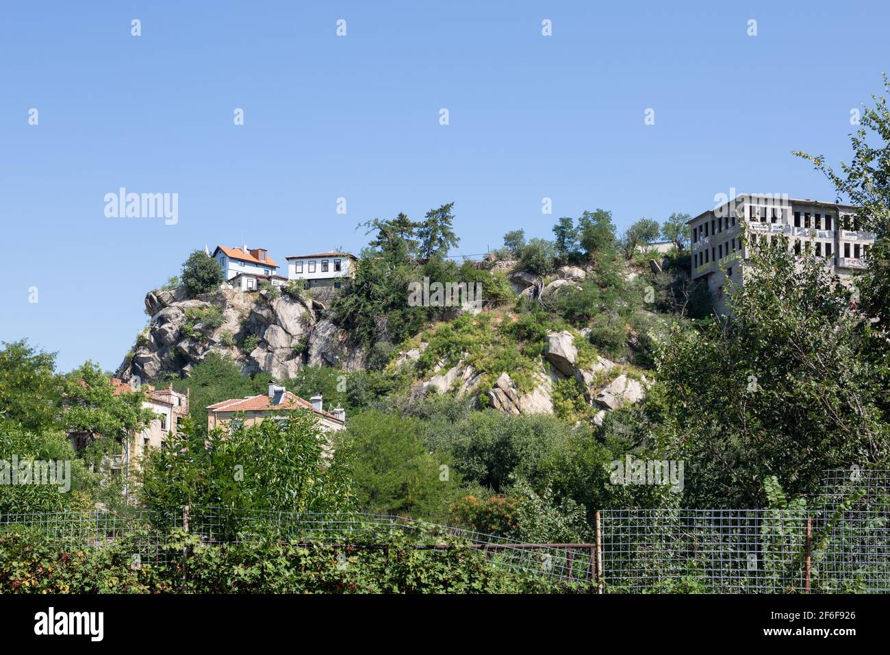 Looking up at a cliff-top building in Plovdiv Old Town, Bulgaria Stock Photo