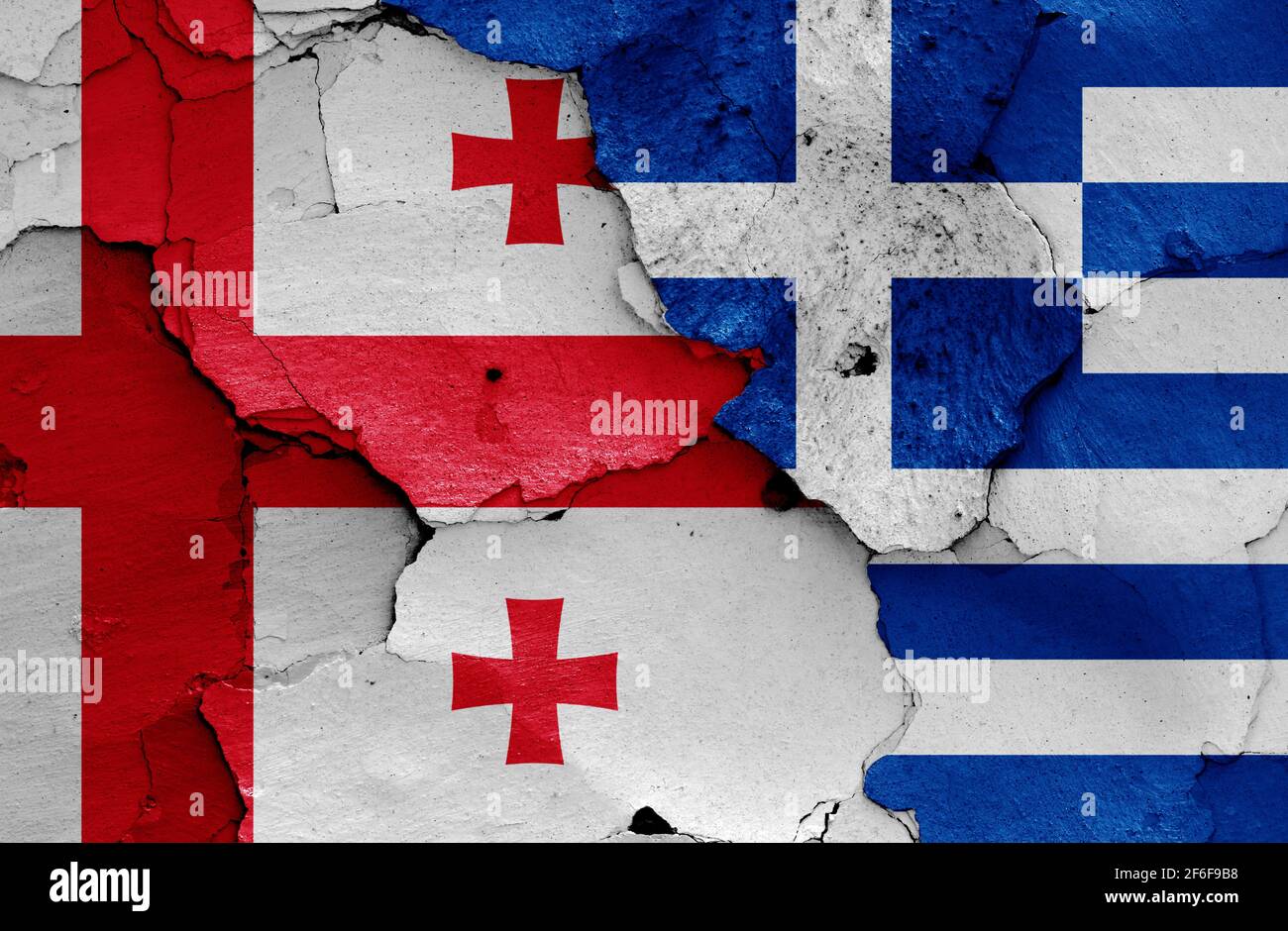flags of and Greece painted on cracked wall Stock Photo Alamy