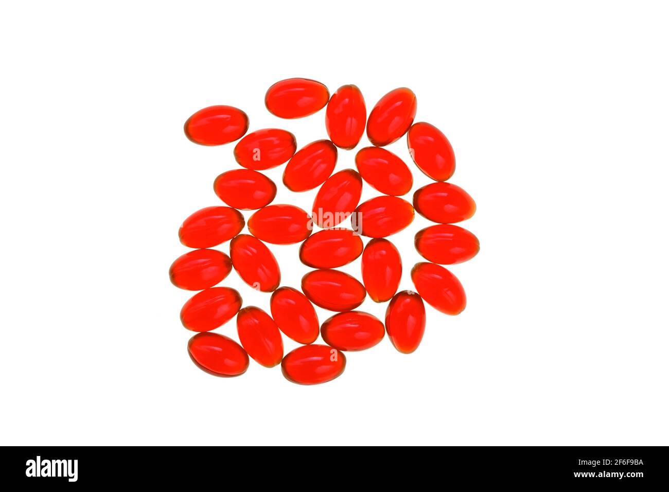 Krill oil red gelatin capsules on white background.Source of omega fatty acids.Healthy food.krill oil supplements Stock Photo