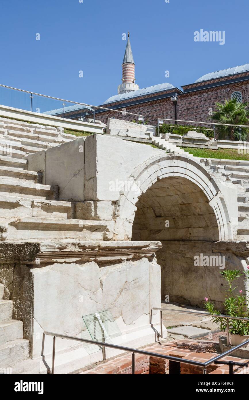 Ancient Stadium of Philipopolis, Plovdiv, Bulgaria, with Dzhumaya Mosque visible in the background Stock Photo