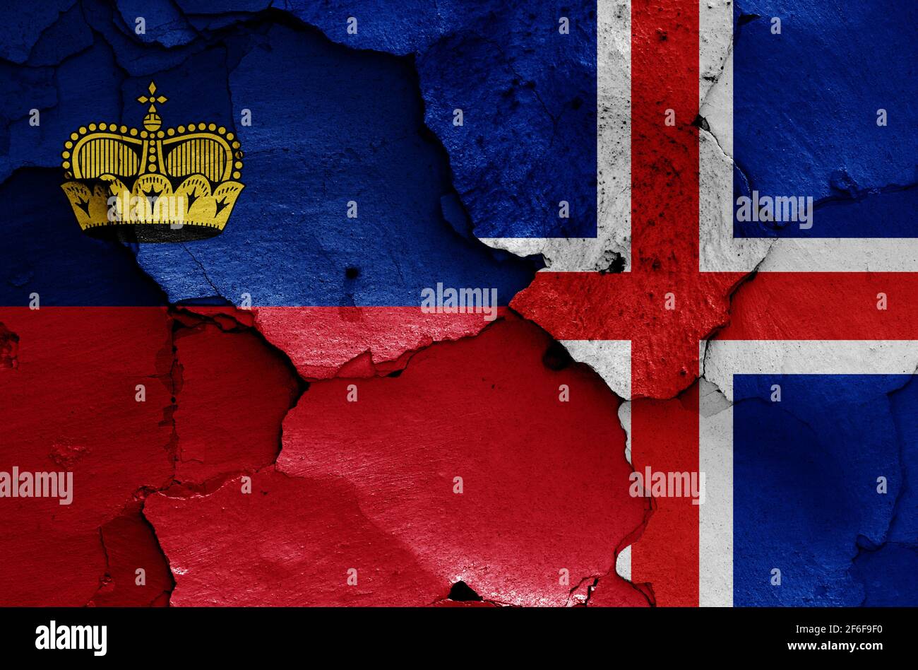 flags of Liechtenstein and Iceland painted on cracked wall Stock Photo ...