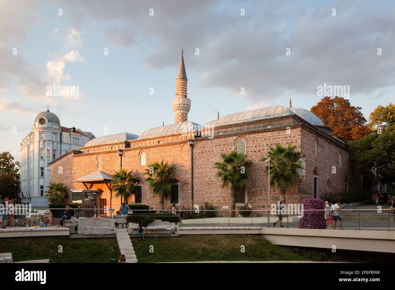 View of Dzhumaya Mosque from the Ancient Stadium of Philipopolis, Plovdiv, Bulgaria, at sunset. Stock Photo