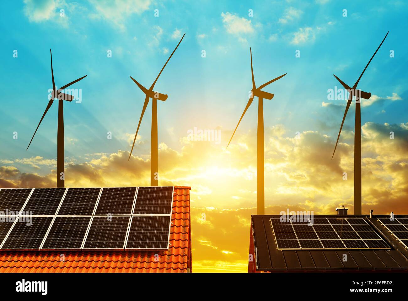 Solar panel on the roof of the house in the background wind turbines at ...