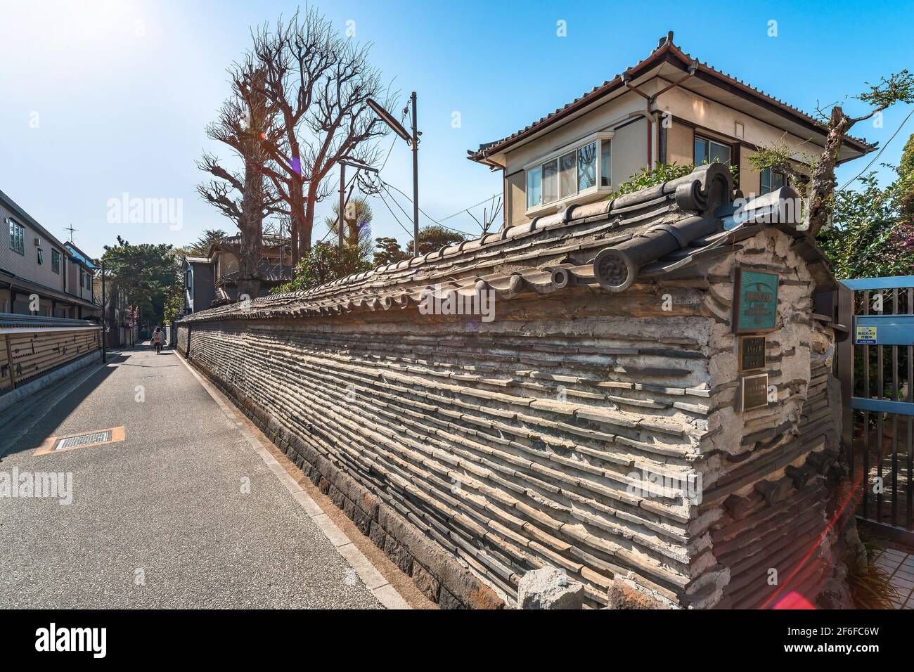 tokyo,japan - march 30 2021: Cob wall called Tuijibei built in a traditional architecture of stacked roof tiles typical of Edo era and classified as c Stock Photo