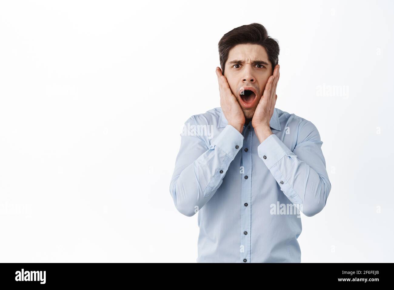Shocked and distressed office guy, manager screaming and look ...