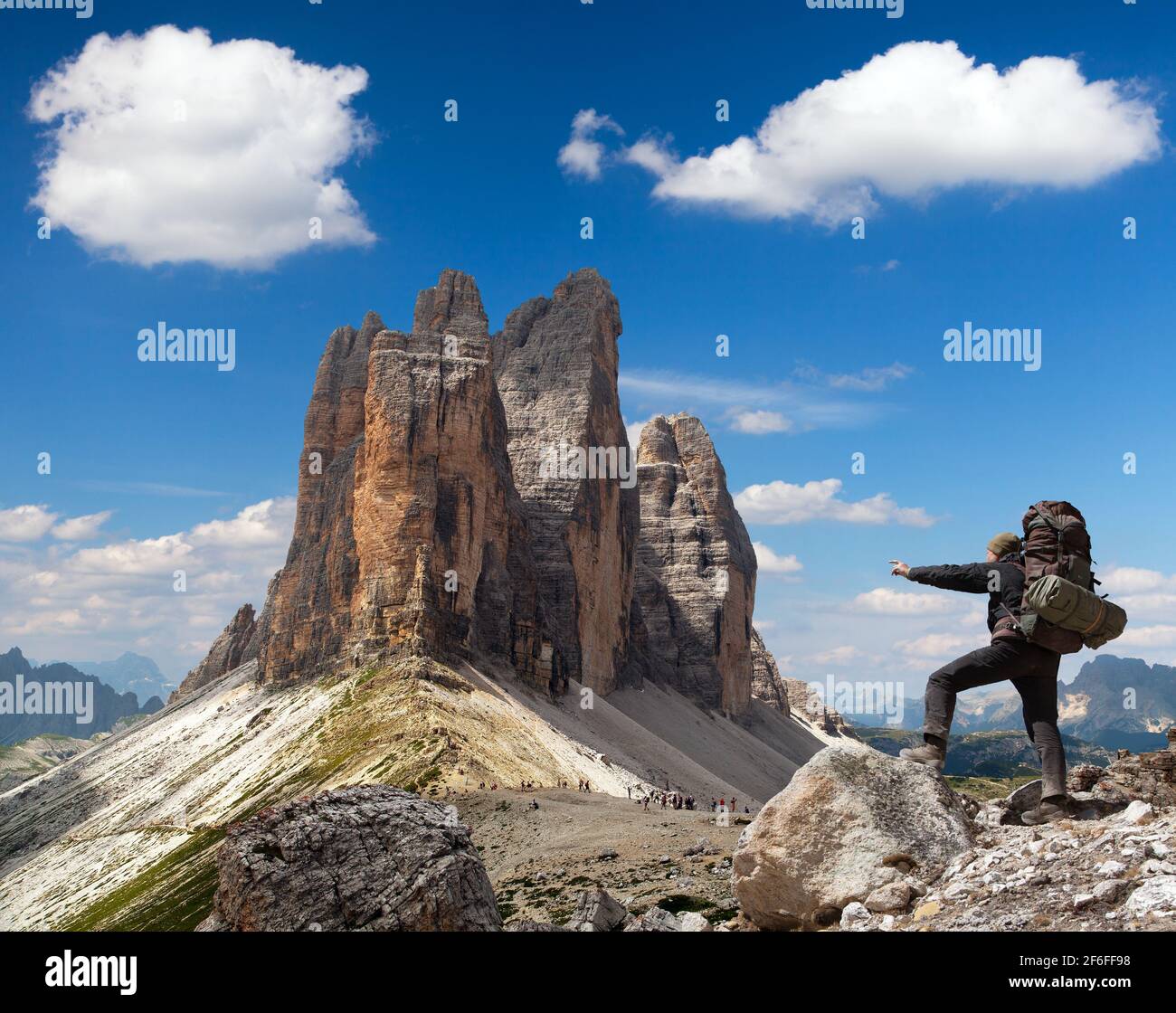 Drei Zinnen or Tre Cime di Lavaredo with hiker, Sextener Dolomiten or Dolomiti di Sesto, South Tirol, Dolomiten mountains view, Italien Alps Stock Photo