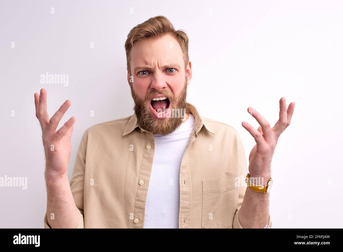 Guy In Despair irritated caucasian man scream in despair shouting at camera isolated ...