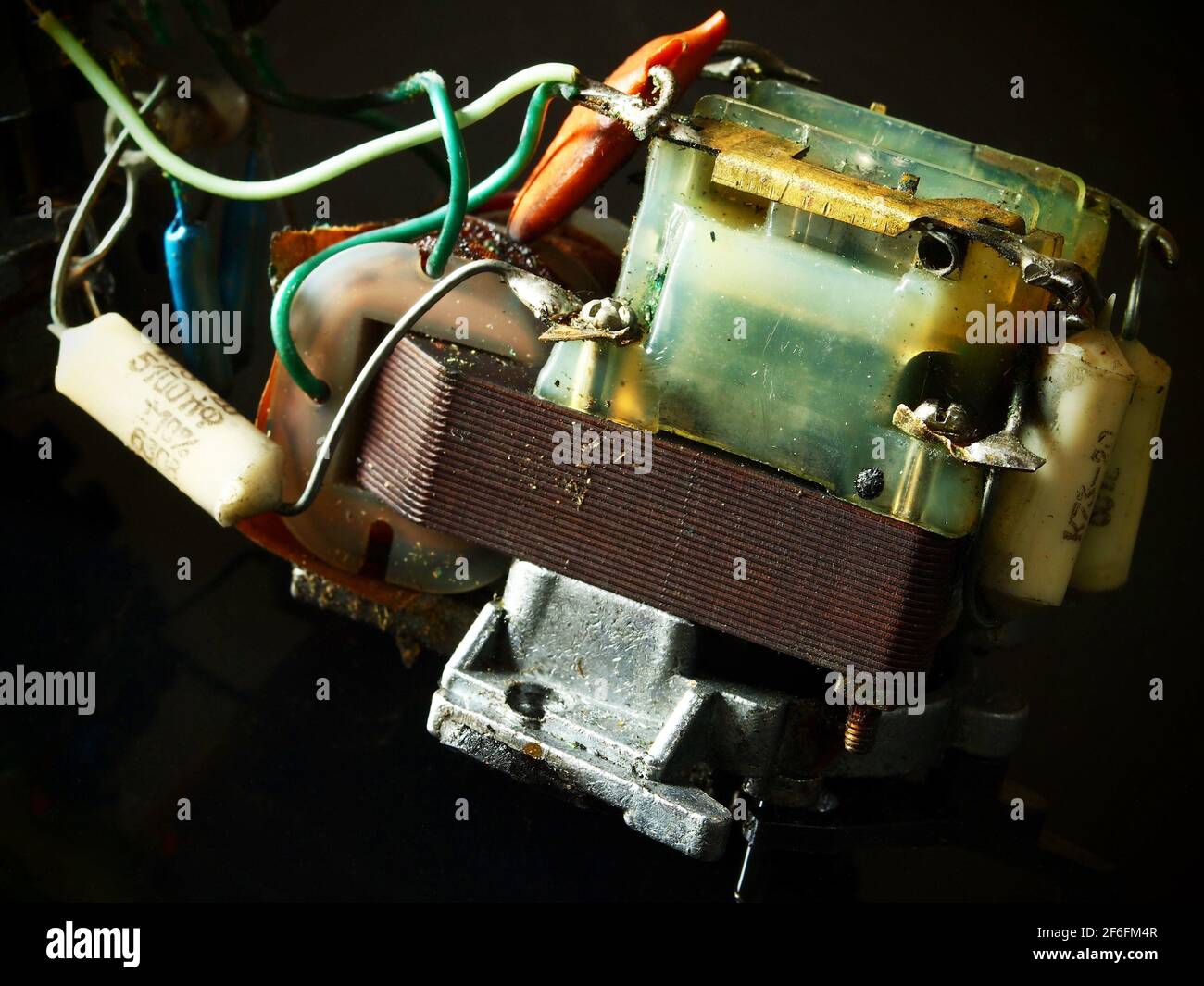 Vintage electricity tranformer with electronic components. Stock Photo
