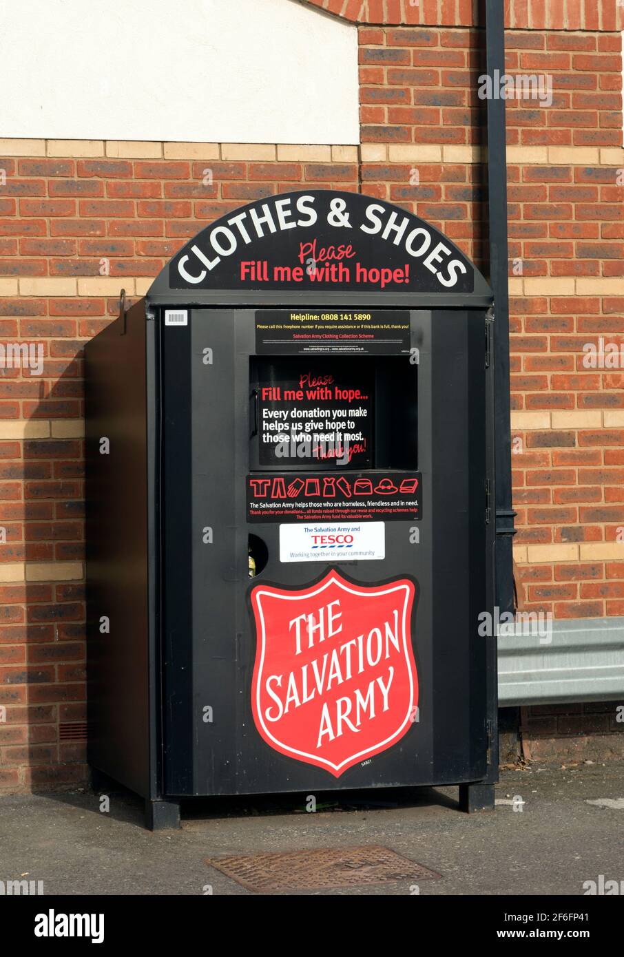 The Salvation Army clothes and shoes collecting bin, Warwick, UK Stock Photo