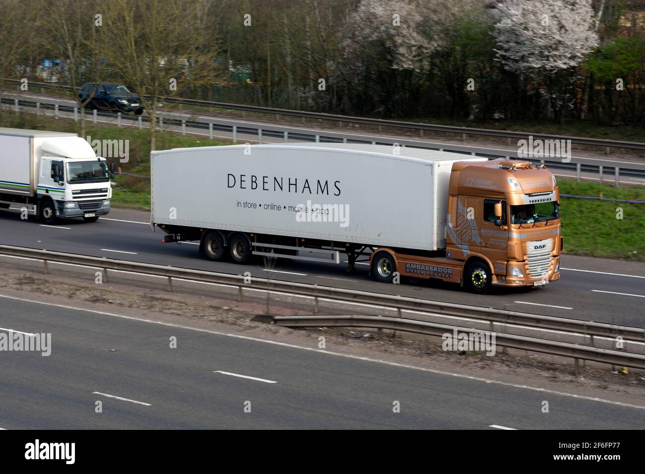 A Debenhams lorry on the M40 motorway, Warwick, UK Stock Photo