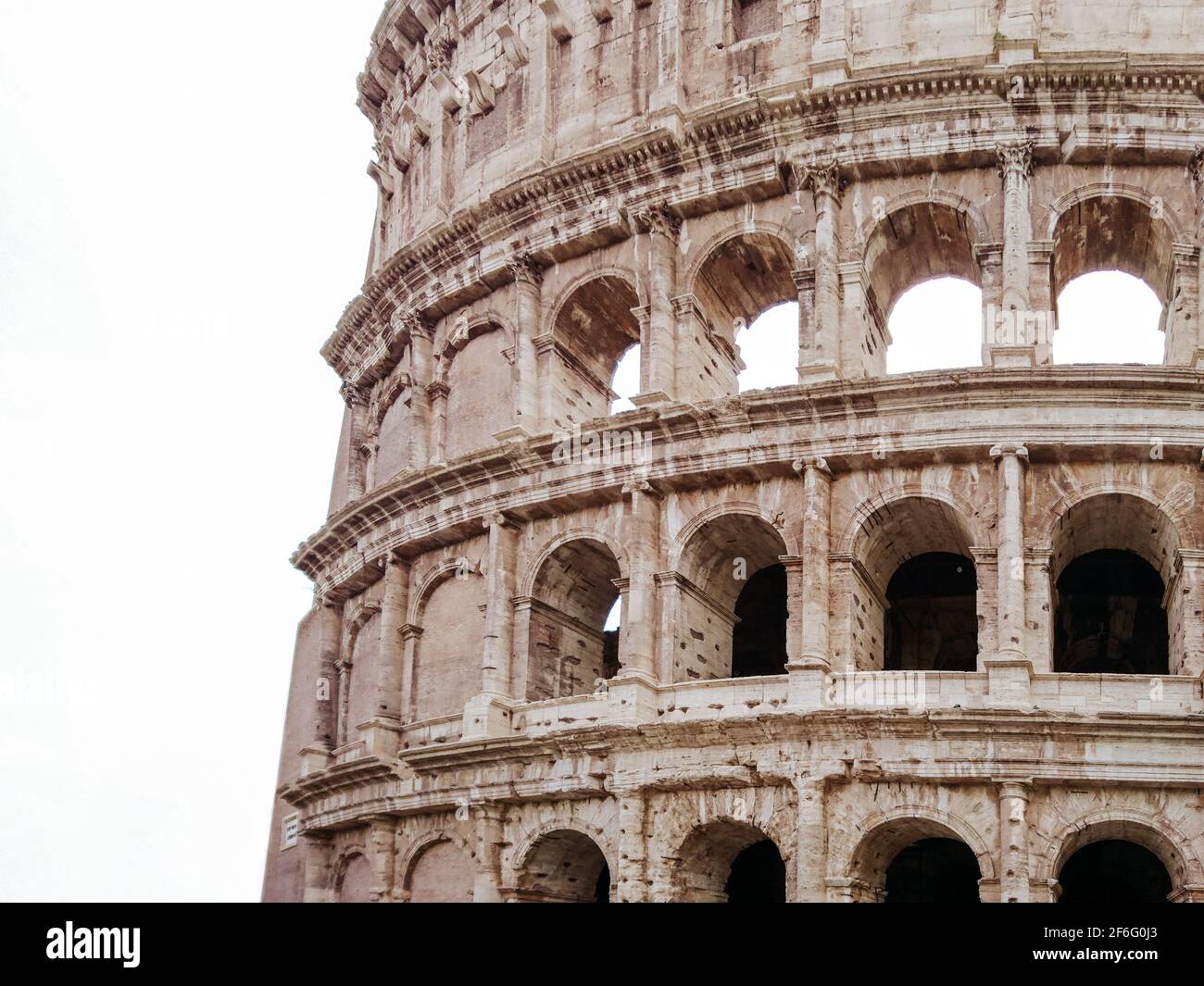 Colosseum marble arches part view on white background. Iconic ancient