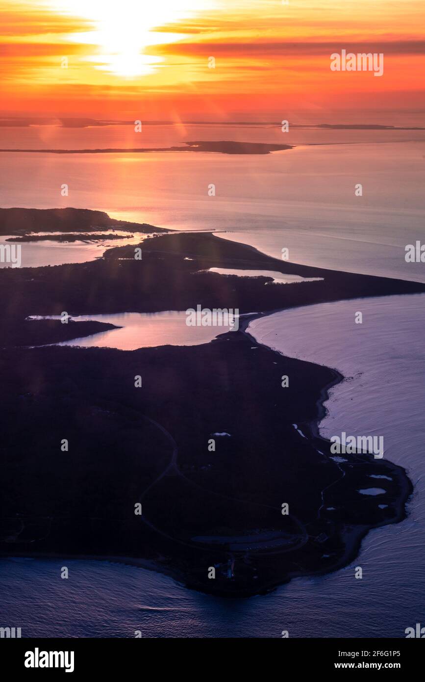 Aerial view over Long Island New York with colorful sunset over the Great South Bay Stock Photo