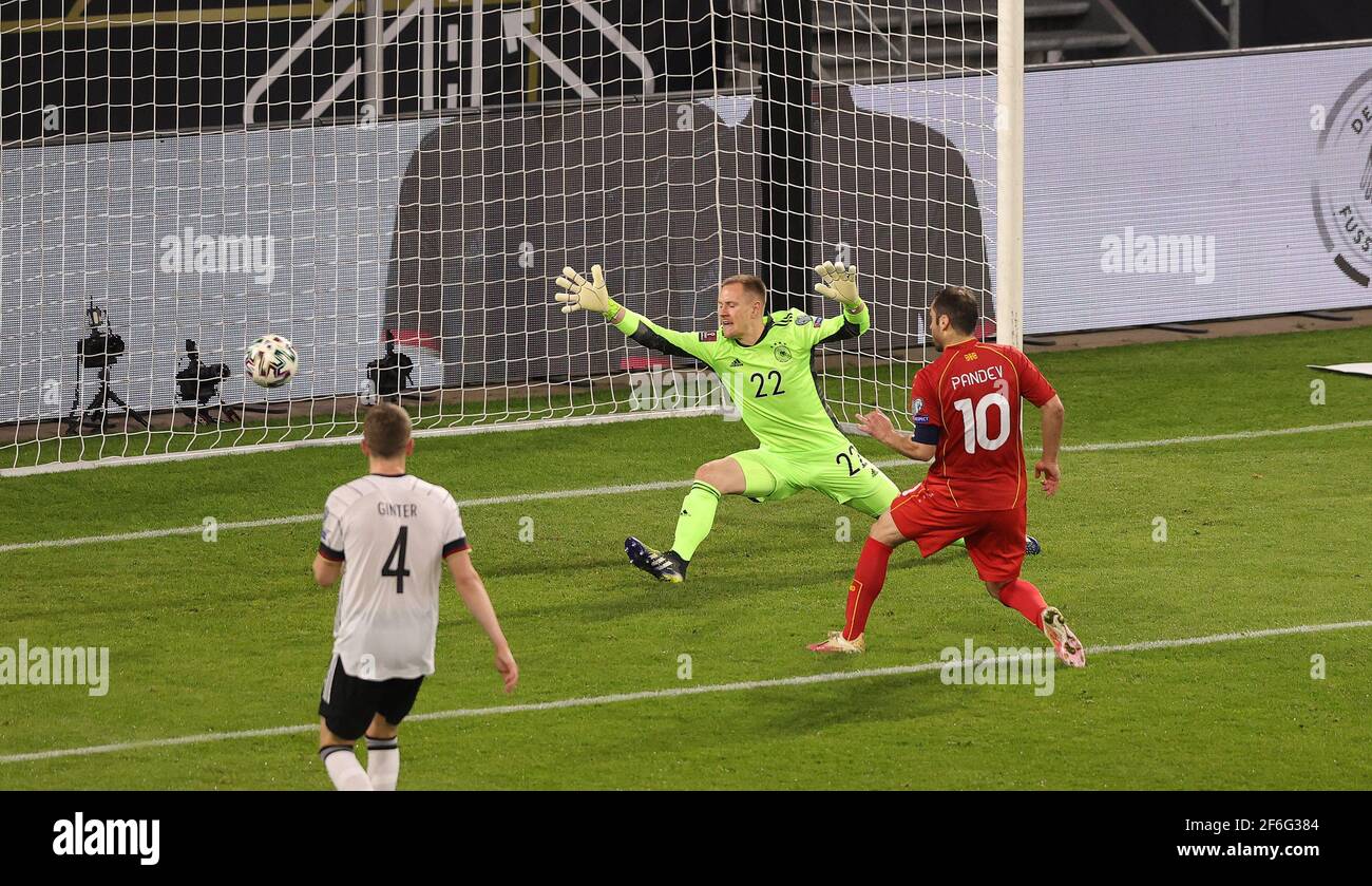 Duisburg, Deutschland. 31st Mar, 2021. firo: 31.03.2021 Football, Soccer: Landerspiel, National Team, World Cup Qualification, World Cup Qualification 2022, Germany, GER - North Macedonia Goran Pandev, shoots, that, goal, to, 0: 1, versus, Marc-Andre ter Stegen | usage worldwide Credit: dpa/Alamy Live News Stock Photo