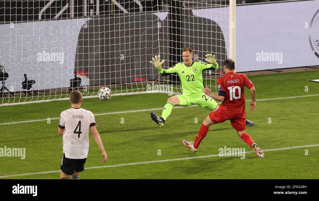 Duisburg, Deutschland. 31st Mar, 2021. firo: 31.03.2021 Football, Soccer: Landerspiel, National Team, World Cup Qualification, World Cup Qualification 2022, Germany, GER - North Macedonia Goran Pandev, shoots, that, goal, to, 0: 1, versus, Marc-Andre ter Stegen | usage worldwide Credit: dpa/Alamy Live News Stock Photo