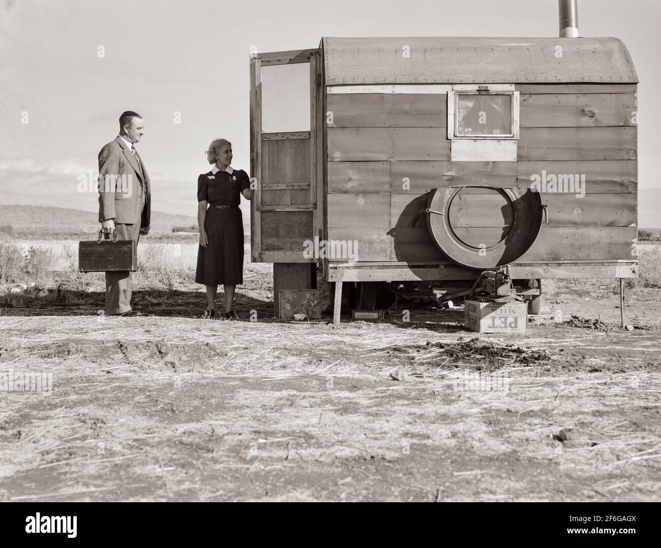 The camp nurse introduces doctor to mother of sick baby. Merrill ...