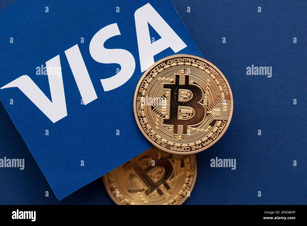 LONDON, UK - March 2021: Bitcoin cryptocurrency on Visa financial service  logo Stock Photo - Alamy