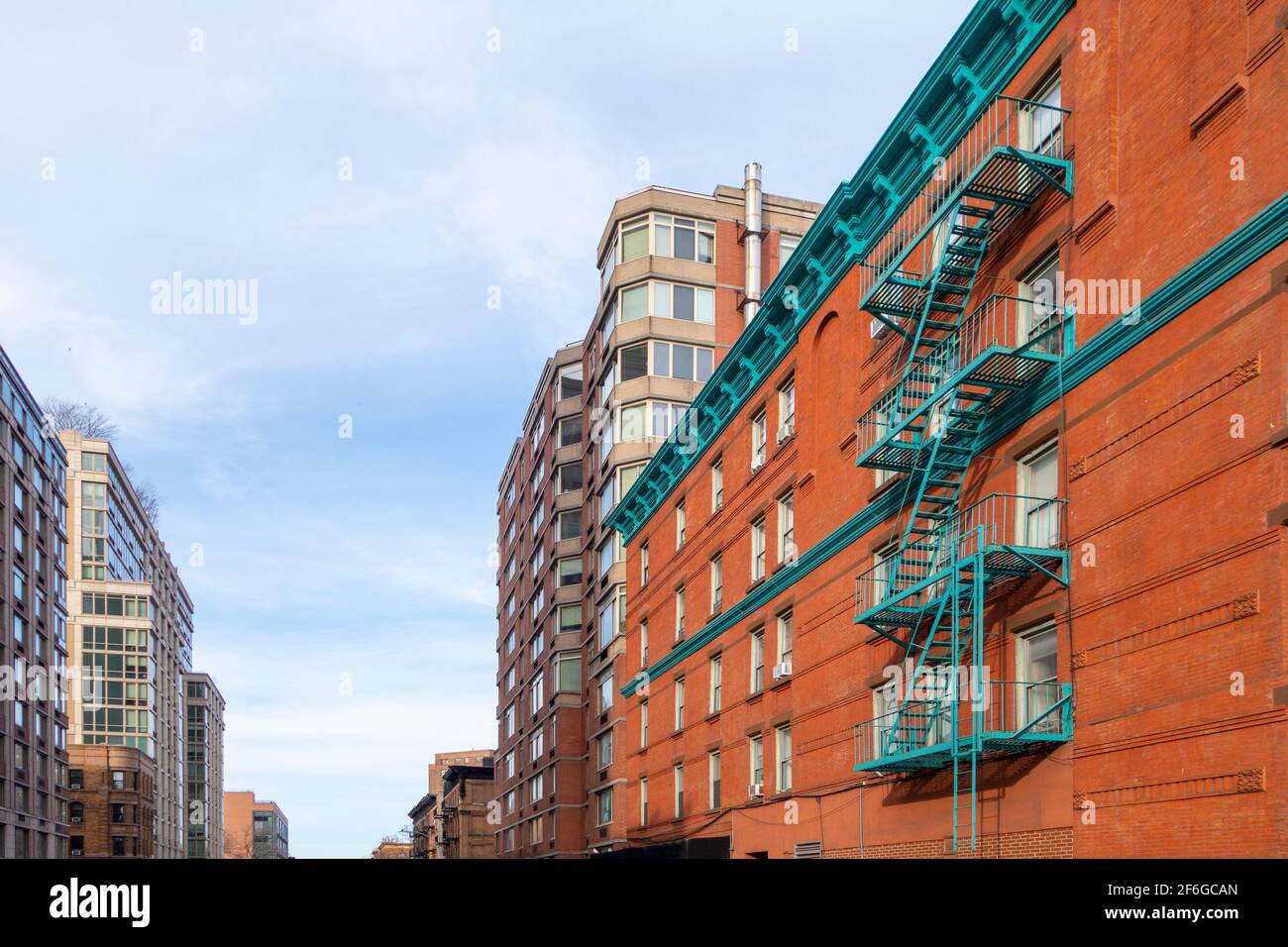 rows of brick building in urban new york city street day sky Stock ...