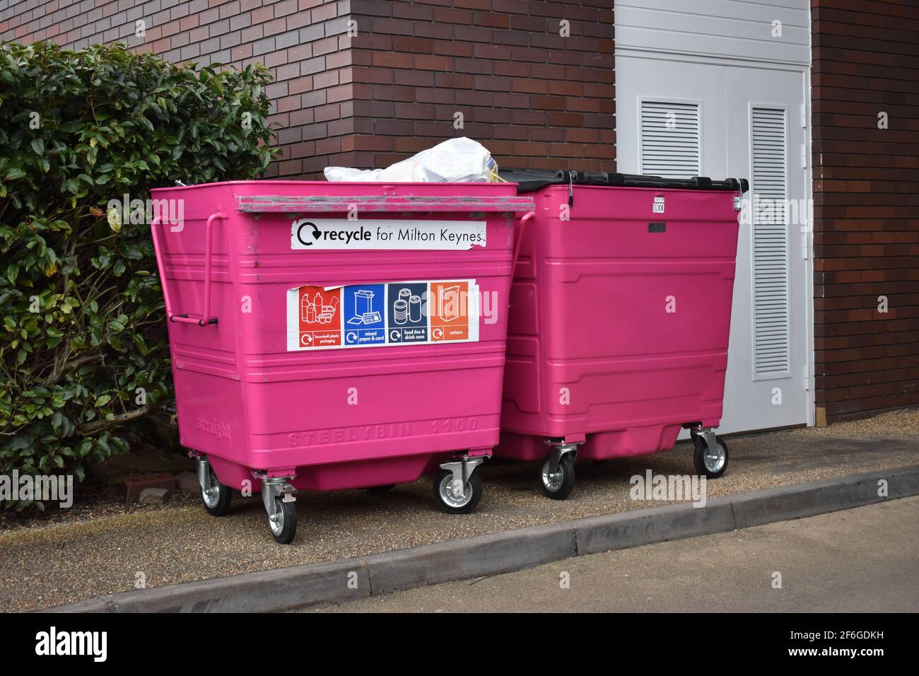 Bright pink recycling bins in Milton Keynes. Stock Photo