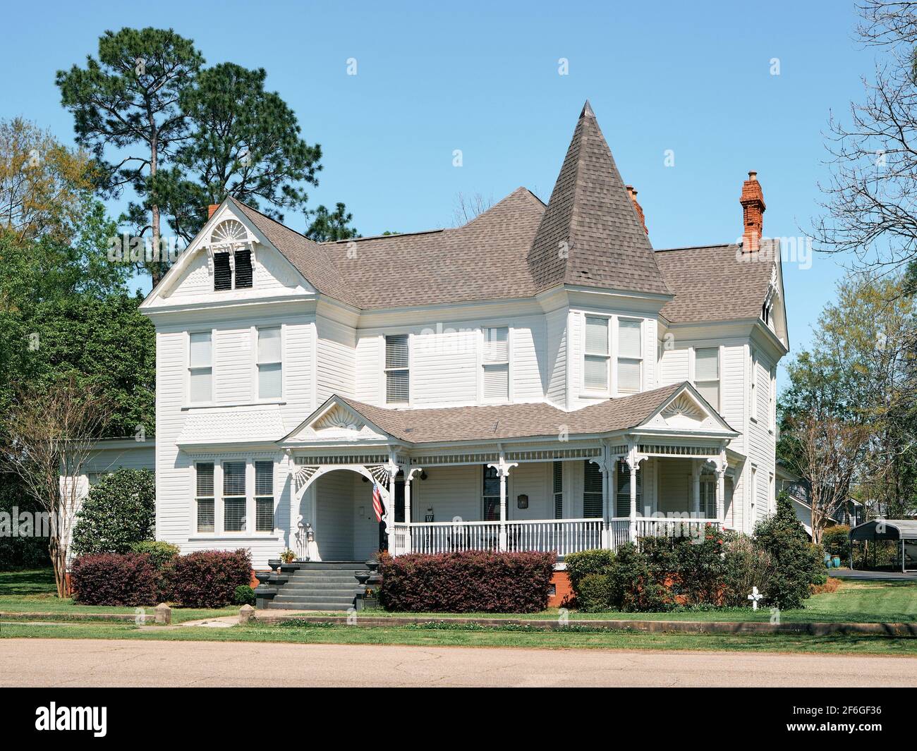 Queen Anne Victorian house or home painted white in Wetumpka Alabama, USA. Stock Photo