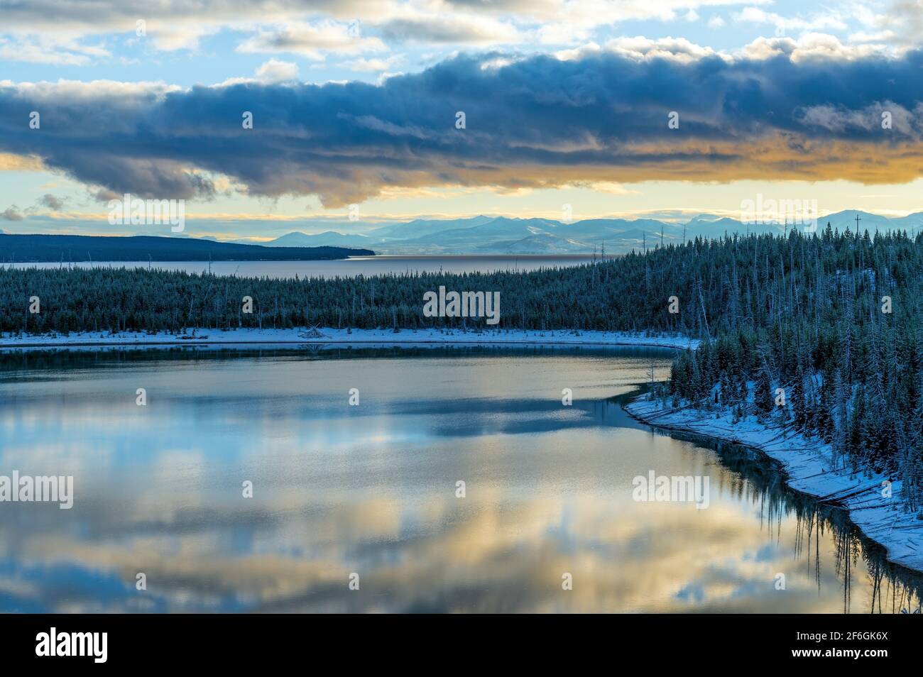 Yellowstone lake at sunrise with snow in autumn, Yellowstone national park, Wyoming, United States of America (USA). Stock Photo