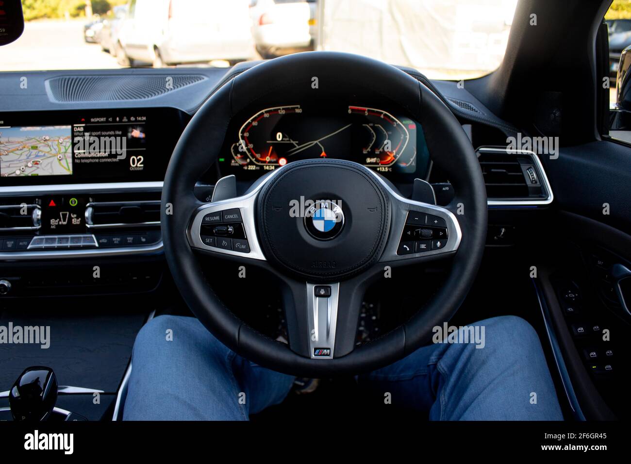 A 2019 BMW 3 Series G20 With Black Leather Multi Function Heated Steering Wheel With Aluminum Inserts Stock Photo