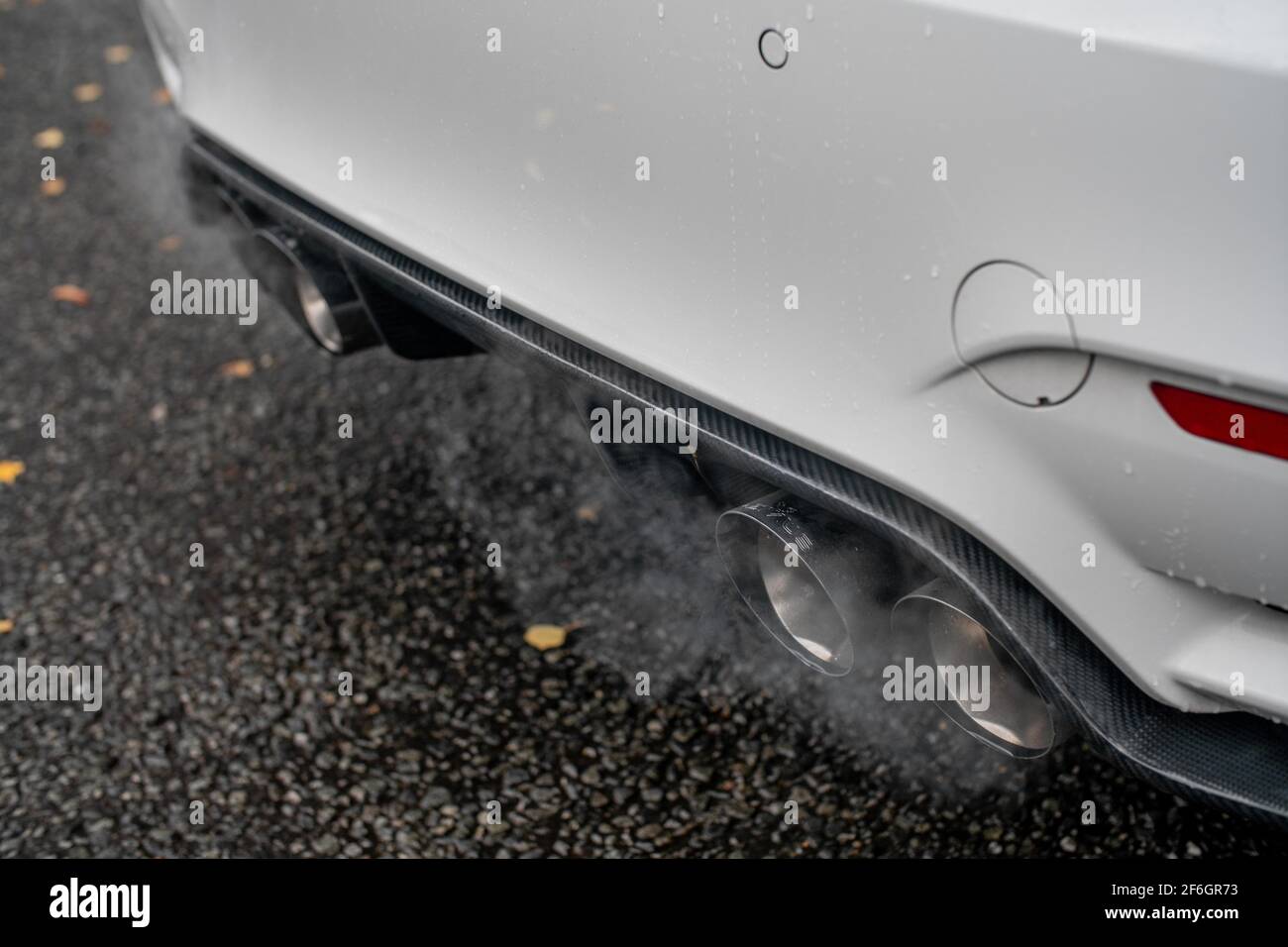 The Remus Chrome Exhaust Tips Of A 2015 BMW M4 F82 Competition Pack