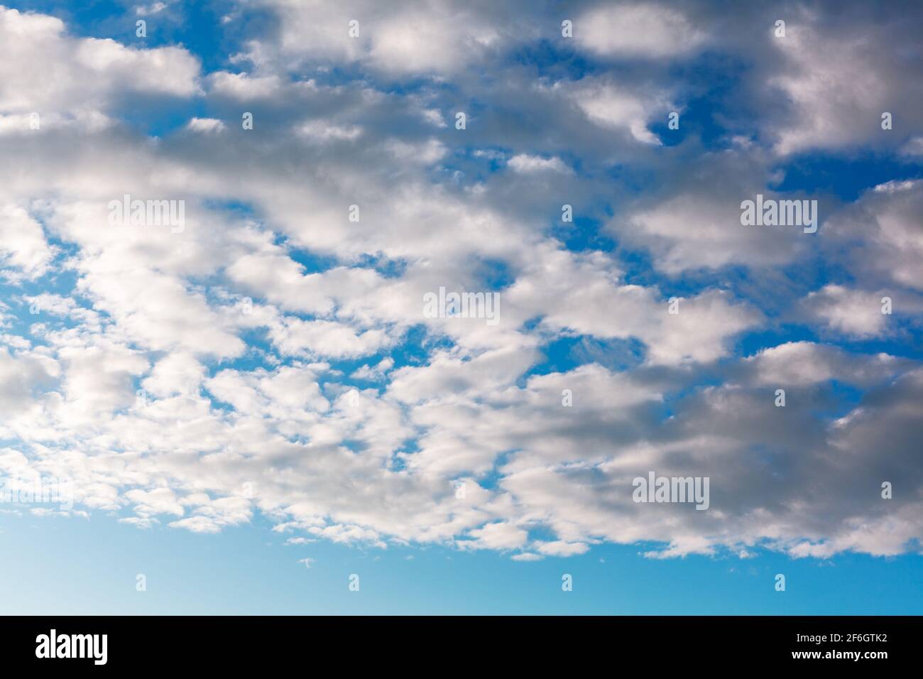 Sky backdrop background with white and grey clouds Stock Photo - Alamy