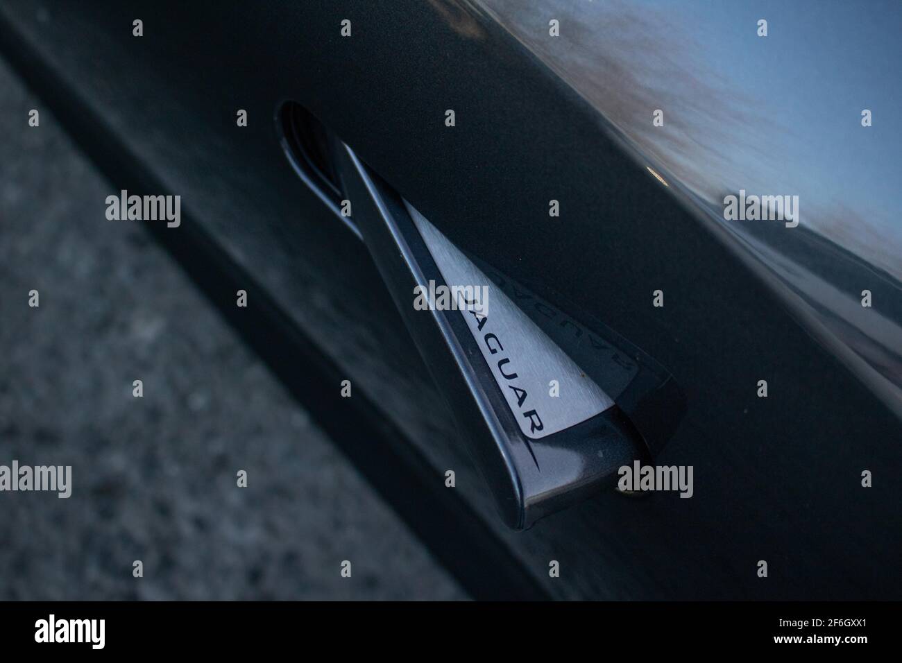 The jaguar Logo On The Door Handle Of A 2013 Jaguar F Type V8 S Stock Photo