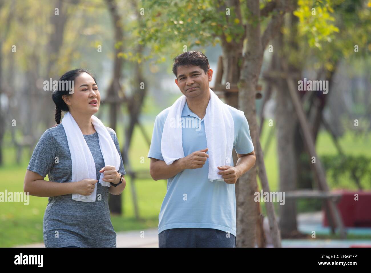 Asian couple jogging running hi-res stock photography and images - Alamy